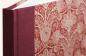 Preview: Linen-backed notebook with a hard cover, burgundy with floral Art Nouveau ornaments